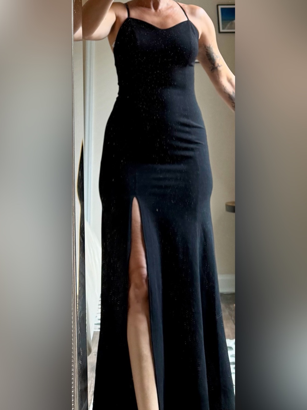 Black floor length dress with deep slit